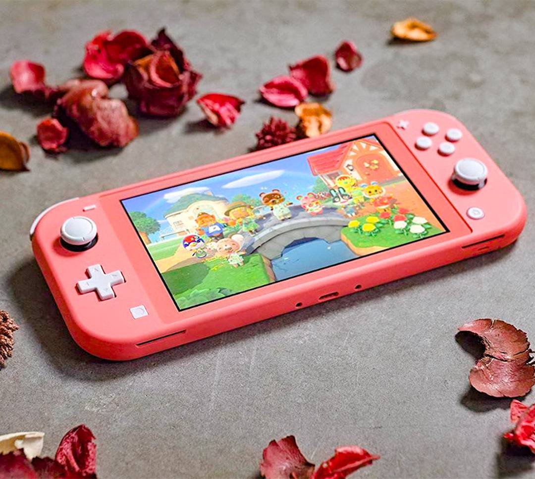 Nintendo Switch Lite Coral Animal Crossing Edición Aloha de Canela